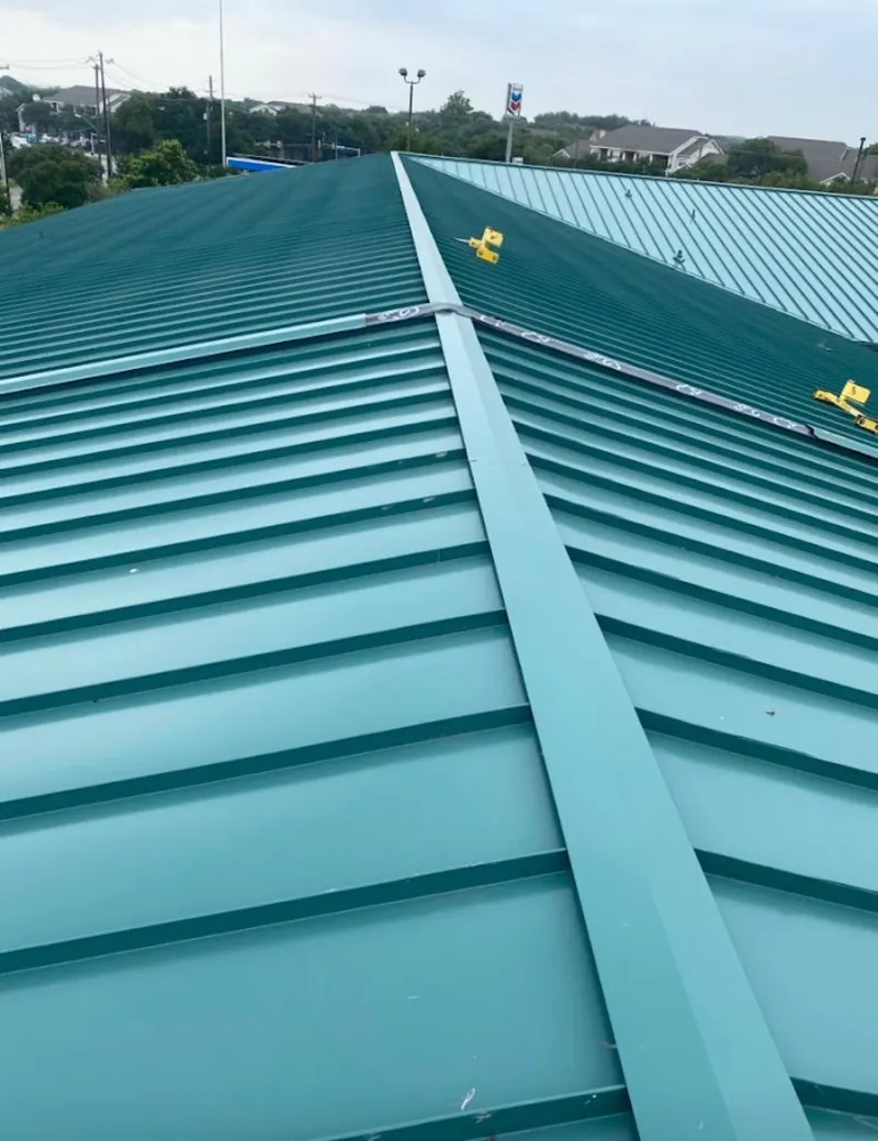 Green commercial metal roof ridge and valley for Metal Roof Repair in Dowagiac